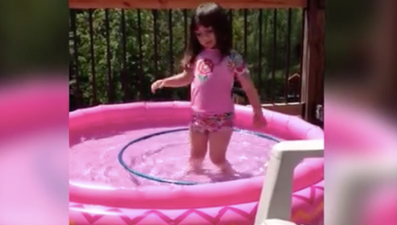 WATCH: This little girl trying to hula-hoop is our spirit animal