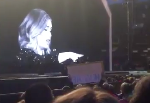 WATCH: Adele calls out fan filming her concert with camera and tripod