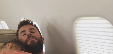 This picture of a napping Chris Hemsworth has the internet melting