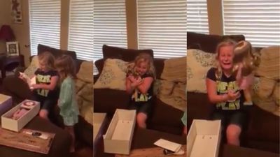WATCH: Young girl breaks down when she gets doll with prosthetic leg