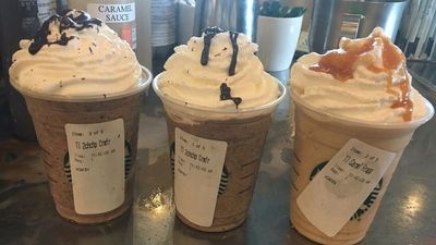 The funny reason Starbucks workers cover the cup logo with an order sticker