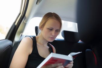 Here’s why you feel sick when reading in a car