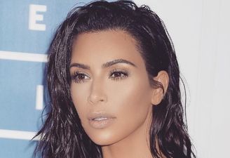 Kim Kardashian got her nails pierced and we’re a little confused about it