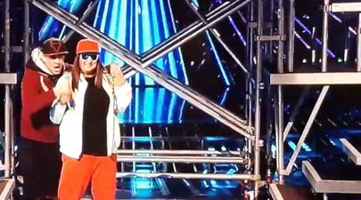 Someone just ran on stage during Honey G’s performance and people are freaking out