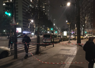 Gunman who took people hostage in Paris travel agency is now on the run