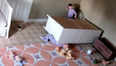 The incredible moment a two-year-old rescues his twin brother from under a fallen dresser