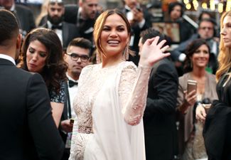 Chrissy Teigen proves how much of a legend she is by falling asleep at the Oscars