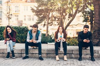 ‘Greet your child with a smile NOT a mobile’, UK school urges parents to put their phones away