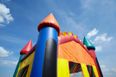 A six-year-old has died, and six others were injured, after a bouncing castle exploded