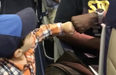 Adorable toddler fist bumping his way onto a flight will brighten your day