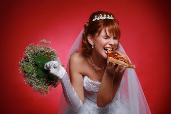This couple served a four-tier pizza instead of cake at their wedding