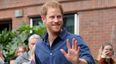 These pictures of Prince Harry playing with a baby gives us all the feels