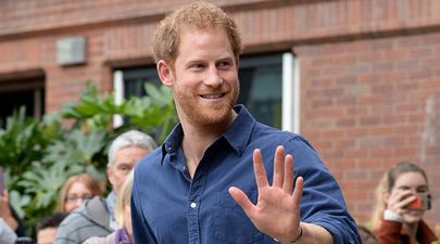 These pictures of Prince Harry playing with a baby gives us all the feels