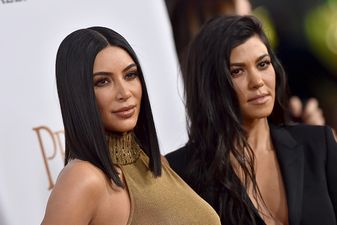 Kim Kardashian just mortified Kourtney with a throwback picture