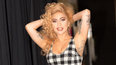 So… Lady Gaga’s fiancé has a massive tattoo of her face