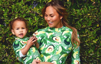 Chrissy Teigen reveals her baby bump and she looks class