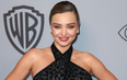 Miranda Kerr debuts her blossoming baby bump at the Golden Globes