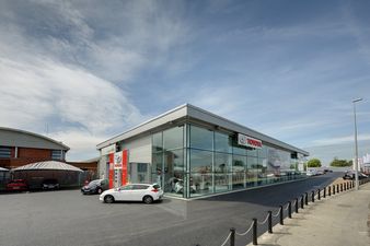 A Dublin motorist drove through the window of a car dealership yesterday evening