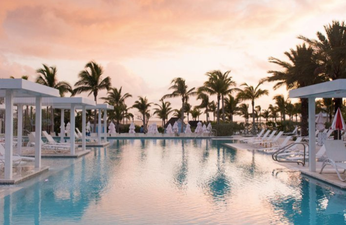 This resort in the Bahamas want to pay you to hang out on the beach all day