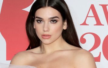 Dua Lipa’s wearing a giant pink tulle gown at the Brits and oh my Christ