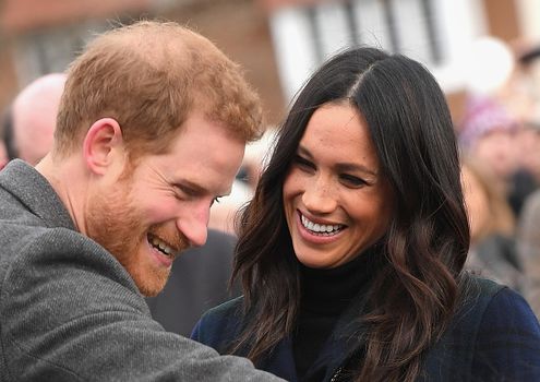 Meghan and Harry couldn't keep their hands off each other on Bondi Beach