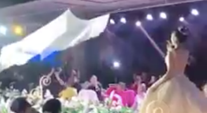 The latest wedding craze involves a flying veil and it’s extremely extra