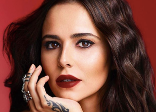 Cheryl is in Cannes and we have serious questions about her footwear