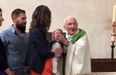 Priest loses temper and slaps crying baby during christening service