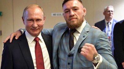 Conor McGregor’s post with Vladimir Putin at the World Cup has people PISSED