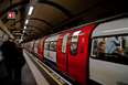 Family-of-three survive falling on tube tracks after ducking under moving train