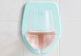 Important: Urban Outfitters is selling shower wine holders, so drink up honey