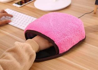 A heated mouse pad exists and it’s going to make cold mornings in the office much easier