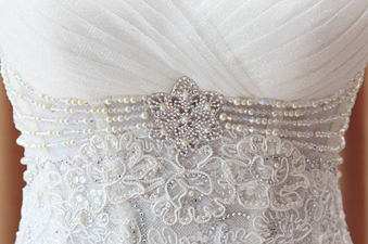 Ewww… Bride clueless after wedding guests vomits on her dress