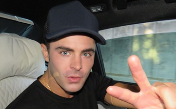 PSA: Zac Efron just dyed his hair platinum BLONDE and looks completely different