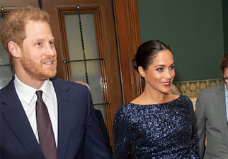 Prince Harry couldn’t stop holding Meghan Markle’s hand in this sweet video from last night