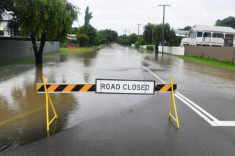 ‘Once in a century’ floods hit northeast Australia as thousands flee their homes