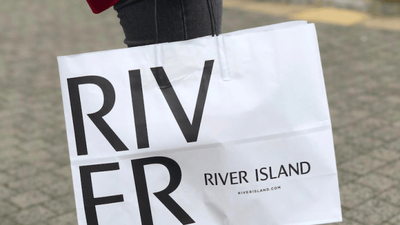 This €60 River Island duster jacket is ideal for keeping cool and covered up in the office