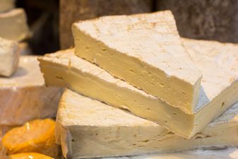 A five-tier wedding cake made from cheese exists and it is beautiful