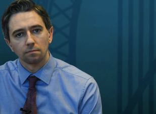 Simon Harris denies he was warned against offering free smear tests last year