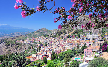 You can buy a gorgeous little holiday home in Italy for €1 and we’re already on a plane