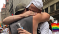 Man attends Pride parade to comfort LGBT people shunned by their families