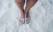 This is the best hack to stop sand sticking to your feet at the beach