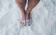 This is the best hack to stop sand sticking to your feet at the beach