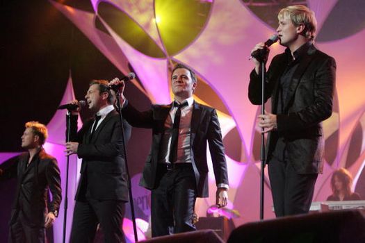 DUBLIN, IRELAND - JANUARY 28: Westlife perform at the 2007 Childline concert at The Point theatre on January 28, 2007 in Dublin Ireland. (Photo by ShowbizIreland/Getty Images)