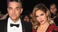 Robbie Williams and Ayda Field ‘to spend daughter’s first birthday with her surrogate mum’