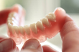 Man inhales false teeth during surgery, has them stuck in throat for eight days