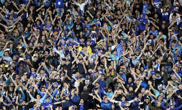 Iranian female football fan facing prison dies after lighting herself on fire