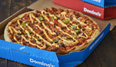 You can now get bacon cheeseburger pizza from Domino’s and our hearts, they ache