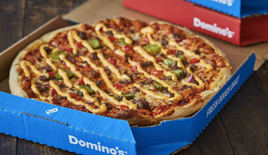 You can now get bacon cheeseburger pizza from Domino’s and our hearts, they ache