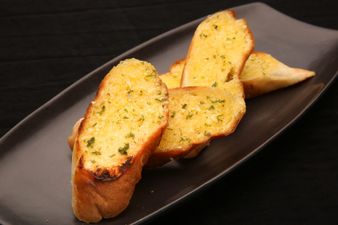 Domino’s are hiring a garlic bread taster in Australia and our bellies, they rumble